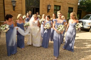 Bride getting in Car Whole Party