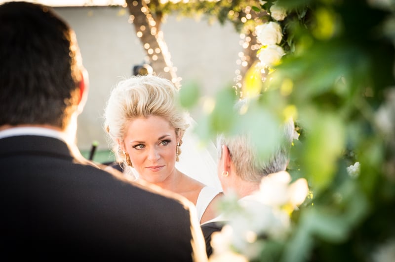 Wedding photographer in Odessa Texas Bride looking at Minister