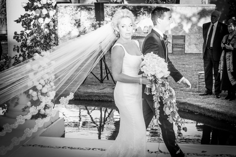 Bridal photographer in Odessa Stepping on Bride 